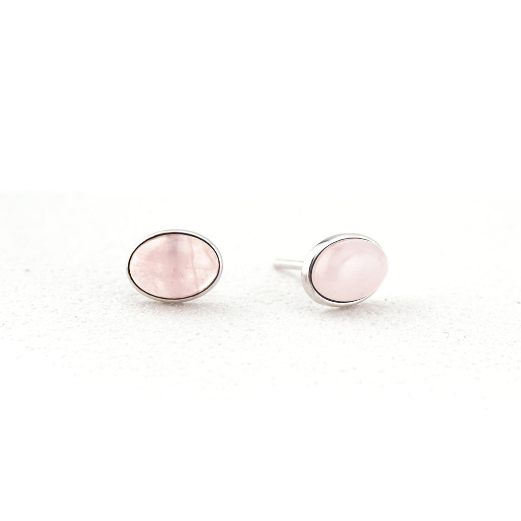 Pair of oval natural Rose Quartz cabochon stud earrings in S925 sterling silver bezel setting
