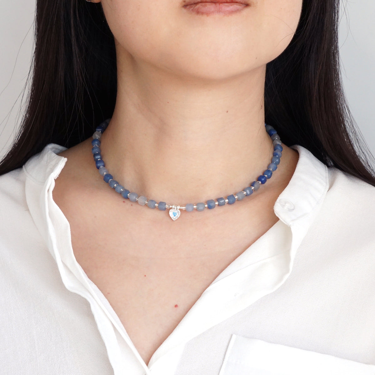 Natural Blue Aventurine beaded heart choker necklace worn on model neck with white shirt
